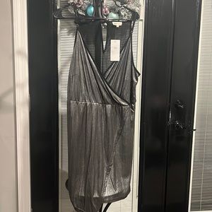 This silver and black dress by clothing obsessed company dress is gorgeous!